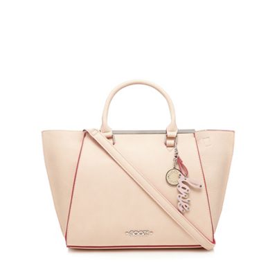 Light pink winged shoulder bag